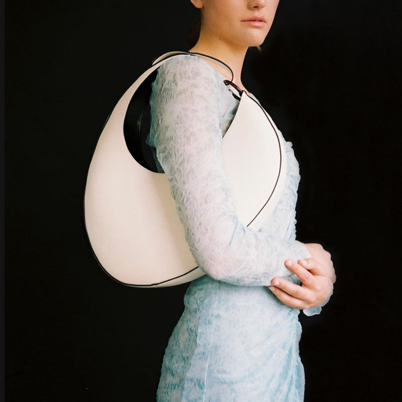 The Signature Curve Bag