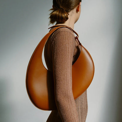 The Signature Curve Bag