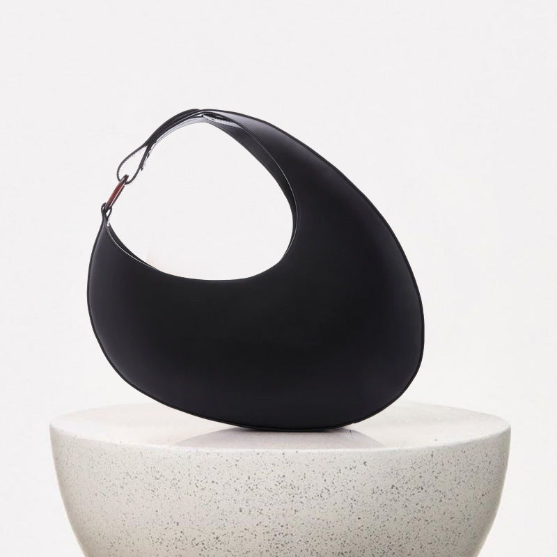 The Signature Curve Bag