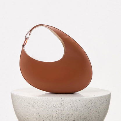 The Signature Curve Bag