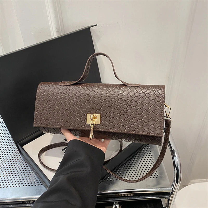 The Woven Muse Clutch