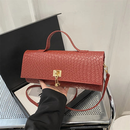 The Woven Muse Clutch