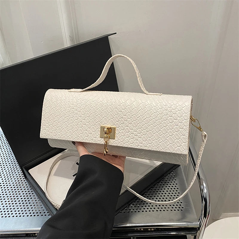 The Woven Muse Clutch