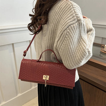 The Woven Muse Clutch