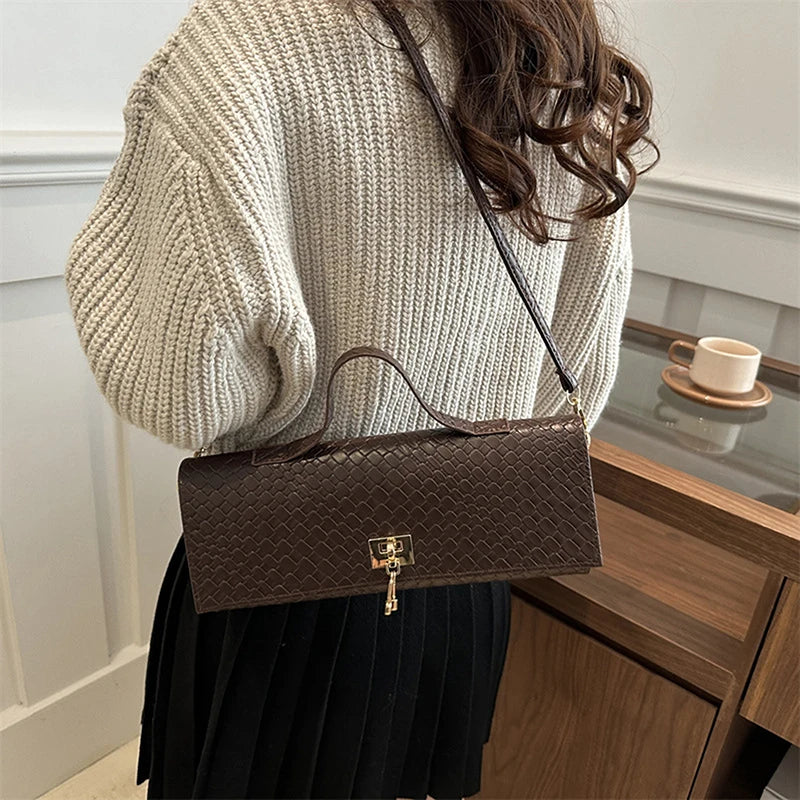 The Woven Muse Clutch
