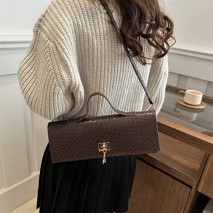 The Woven Muse Clutch