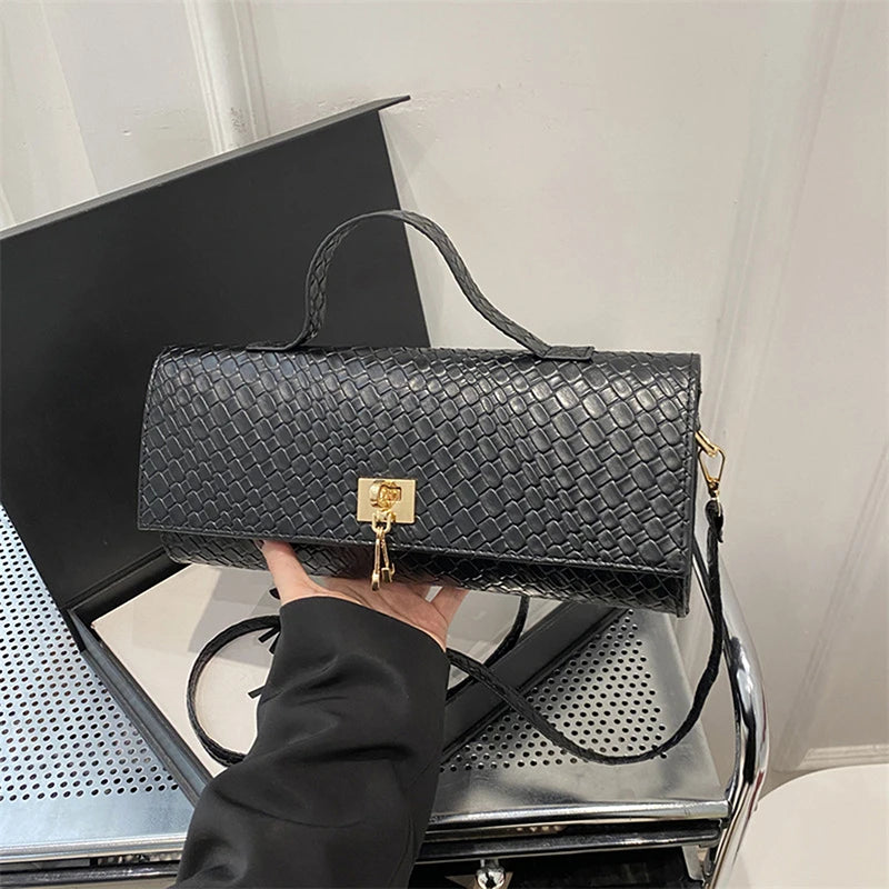 The Woven Muse Clutch